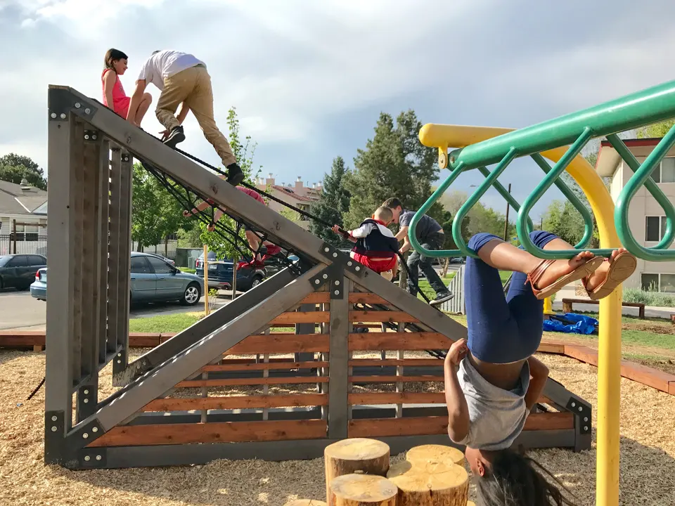 Children using climbing structure